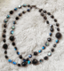 BLACK CHUNKY - Double strand Czech glass with aurora borealis finish. Hand-chained on nickel. Available as a single strand. Silver-plated pewter toggle clasp.  19" Hand-chained. The double is $188. Single $98. 