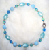 ROBIN'S EGG -   Vintage blue moonglow lucite and cracle beads. 16.5" Silver-plated pewter toggle clasp. $82 